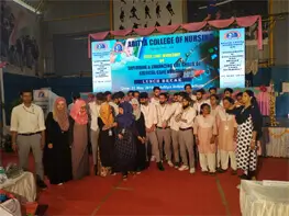 Award ceremony recognizing the best nursing colleges in Bangalore with trophies and certificates.